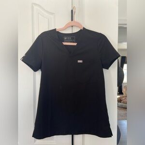 FIGS Classic Black Short Sleeve Top “BLM” on shoulder